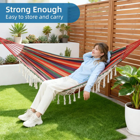 Woman relaxing in Brazilian Style Double Hammock With Fringe For Two People Outdoor Patio Or Indoors Cozy Breathable Fabric
