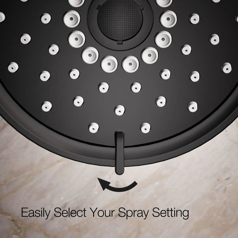 Close-up of Purist Three Function Showerhead With Handheld 1.75 GPM Matte Black dial for spray setting selection