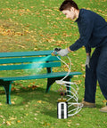 Dang Lightweight 2 Liter Spray Paint Pressure Pot With Pneumatic Air Hose For Automotive And Home Painting Projects delivering smooth spray on a park bench.