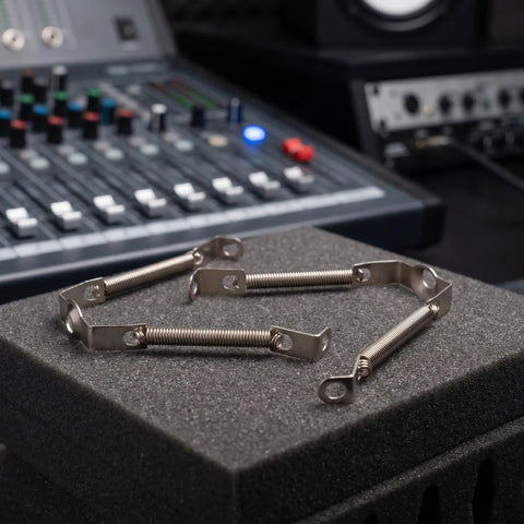Spring Loaded Tube Retainer Clips Five Pack For Guitar Amps And Vintage Audio Gear displayed on foam surface