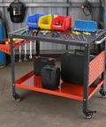 Bad Boy Multi Function Welding Workbench 36 By 24 Inch Reinforced Steel Mobile Cart Table with tools on top.