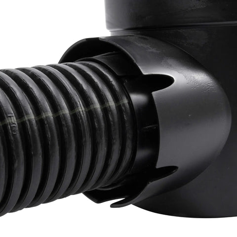 Close-up of Spee-D Round Catch Basin Drain with one outlet connected to a ribbed pipe, showing detailed plastic material and connection.