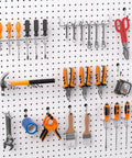 Slick Shop Pegboard Organizer And Hook Lock Kit With Heavy Duty Storage Bins organized with tools like pliers, wrenches, and screwdrivers on a pegboard.