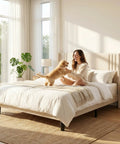 Prime Queen Bed Frame With Plush Wingback Headboard And Heavy Duty Steel Base For Ultimate Lounge Comfort And Durable Support To Kick Back And Rock Your Bedroom Setup with woman and puppy.