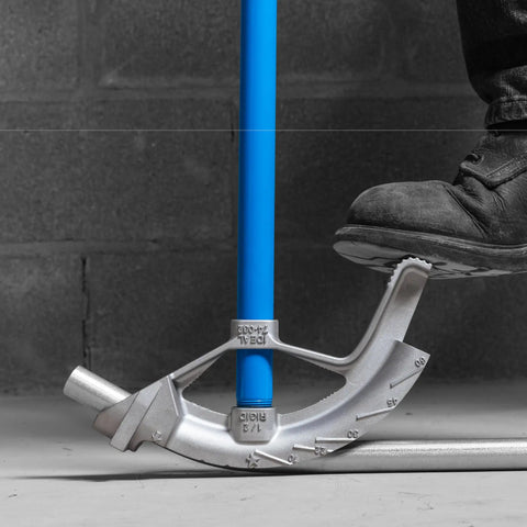 Heavy Duty 3/4 Inch Emt Electrical Conduit Bender By Ideal in use, featuring an aluminum handle and heat treated head for accurate bending.