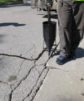 2.6 Gallon Pour Pot With Wheels For Asphalt Crack Sealant 14 Gauge Welded Steel Construction Cold Crack Sealant Applicator in use