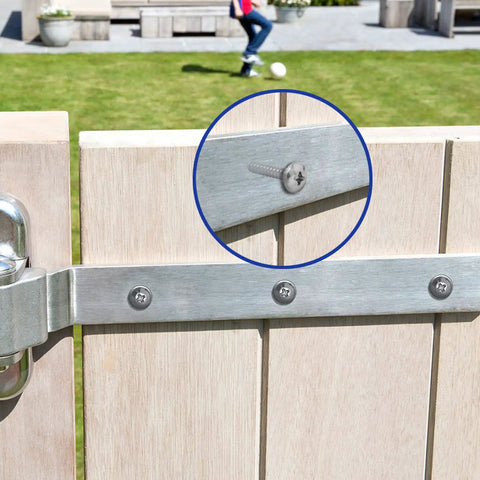 Heavy Duty Truss Head Wood Screws With Phillips Drive Made From 18 8 Stainless Steel Tough As Nails Rustproof Protection Includes Full 100 Piece Set For Decking Construction And Diy Projects To Get Job Done Right First Time Always. close-up on screw securing gate hinge
