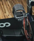 Strap In Platform Pedals For Peloton Bikes And Regular Shoes With Extra Wide Platform And Anti Slip Grips on wooden floor