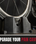 Close-up of Indoor Bike Trainer Front Wheel Riser Block With Three Adjustable Heights holding a front wheel, for Wahoo Kickr setup.