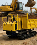 Heavy Duty Mini Crawler Dumper Workhorse With Kickass Hydraulic Dump Bed And Grippy Steel Tracks on job site hauling gravel.