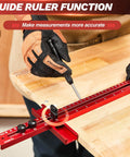Carpenter using Pro Grade 4 In 1 Router Milling Groove Bracket For Woodworking on a wooden board for accurate measurements.