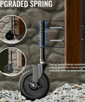 Heavy Duty 5 Inch Spring Loaded Gate Wheel Caster With Side Brake And Automatic Height Adjustment showing spring mechanism on rocky ground.