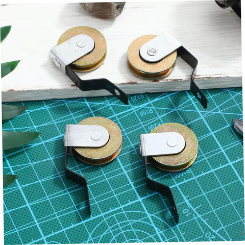 Four Pack Sliding Door Wheel Replacement Kit With Hanging Screen Rollers For Top And Bottom Tracks, shown disassembled on a mat