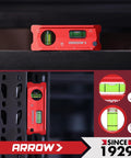 4 Inch Torpedo Level Offering Killer Magnet Grip And Dead On Accuracy on a black surface with clear bubbles for precision.