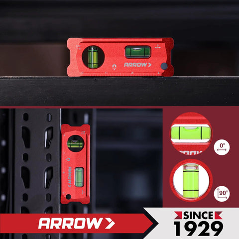 4 Inch Torpedo Level Offering Killer Magnet Grip And Dead On Accuracy on a black surface with clear bubbles for precision.