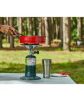 BottleTop Propane Stove Portable Camping Cooker With Adjustable Burner And 10,000 Total BTUs Of Cooking Power in outdoor setting