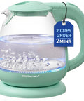 Elite Gourmet Mint Glass Electric Kettle 1L BPA-Free Fast Boil Cordless With Auto Shut Off, boiling water with blue LED.