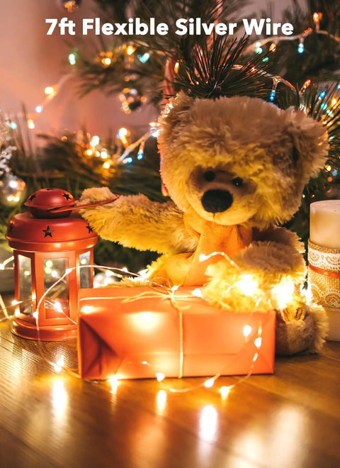 Six Pack Battery Operated Fairy Lights With Seven Foot Copper Wire 20 LED Waterproof String Lights For DIY Crafts Wedding Decor Table Centerpieces Mason Jars Party Ambiance wrapped around teddy bear and gifts