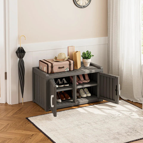 Weatherproof Outdoor Shoe Storage Cabinet With 2 Barn Doors And Adjustable Shelves And Waterproof UV Resistant Entryway Bench For Indoor Outdoor Use This Rugged Resin Shoe Organizer In Classic Grey shown in a room with barn doors open, displaying shoes inside.