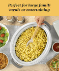 Heavy Duty 7 Quart Programmable Slow Cooker With Secure Locking Lid And Bright Digital Screen Cook And Carry Electric Pot serving macaroni meal.