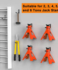 Six orange heavy-duty jack-stand wall mounts for hanging 2–6 ton stands on a gray garage wall