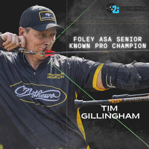 Archer aiming with precision, wearing branded shirt, showcasing focus and inflight stability for competitive shooters.