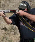 4 Packs 7 Rounds 12 And 20 Gauge Tactical Shotgun Shell Holder Carrier With Adhesive Side Saddle shown in action on rifle