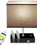 Color Changing Smart Lamp For Bedroom With App Control And WiFi Alexa Support, two phone stands, USB ports visible