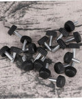 Twenty Adjustable Furniture Leveling Cups With Threaded Socket Design For Quick Install and Slick Glide Motion On Wood Tables Metal Chairs Desks And Bar Stools Zero Hassle Setup For Modern Office Or Laid Back Home Hangouts, black threaded glide cups on fabric surface.
