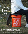Total Game Changer Camp Toilet Seat With Ultra Plush Cushion And Secure Swivel Lid Fits Standard 5 Gallon Bucket on a camping bucket.