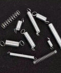 Heavy Duty Spring Assortment Kit 200-Piece Zinc Plated Steel Wire Extension Springs Set for Shop and Home Repairs displayed on black