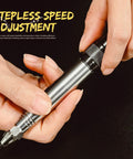 Hands adjusting the speed on a Precision Pneumatic Engraving Pen And Air Scribe Tool for detailed etching work.