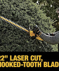 Man using Powerful 20V Max Cordless Hedge Trimmer with 22 Inch Laser Cut Blade on hedge, showcasing trimming capability.