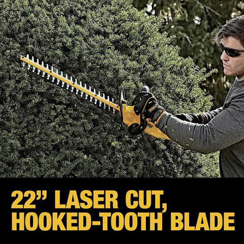 Man using Powerful 20V Max Cordless Hedge Trimmer with 22 Inch Laser Cut Blade on hedge, showcasing trimming capability.