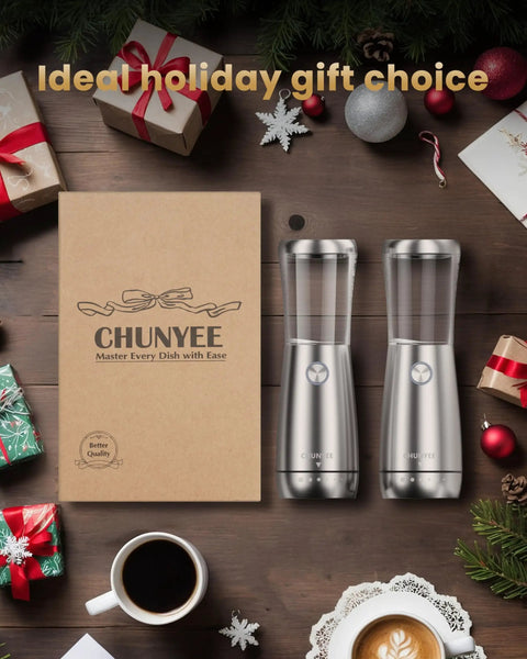 Sleek Stainless Steel Electric Salt And Pepper Grinder Set With Led Light, Adjustable Coarseness, Rechargeable Battery, Storage Base, Premium Automated Spice Mill For Modern Kitchen Gadgets on a holiday-themed table.