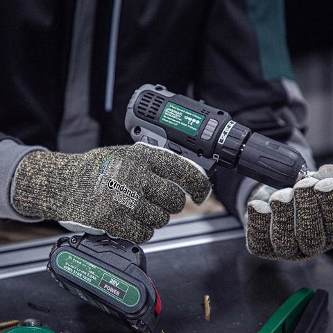 Person using a drill while wearing Level 5 Cut Resistant Work Gloves For Gardening And Tough Jobs, Aramid And HPPE, Size Large.