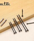 Heavy Duty Exterior Wood Deck Screws Built To Last Tough As Nails One And A Half Inch Flat Head Epoxy Coated Rust Resistant Carbon Steel T25 Star Bit 322 Pieces Pack Two Pound Set For Outdoor Decking And Fence Projects shown with drill bits on wood surface