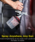 Heavy Duty Paint System Spray Gun Adapter F16 With 16 Mm Female Thread And 1.5 Mm Pitch For High Pressure Low Volume Gravity Feed Cups mounted on spray gun.