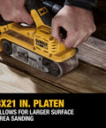 Heavy Duty 20V Max Cordless Belt Sander With A Badass Brushless Motor And Hassle Free Airlock Dust Capture For Top Tier Woodworking And Smoother Finish Results Tool Only close-up on 3x21 inch platen sanding wood.