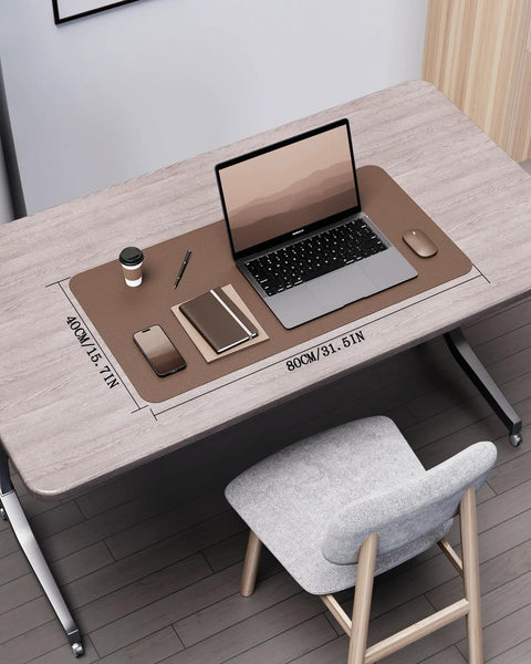 Double Sided Leather Desk Pad With Eco Cork Backing, Large 31.5 By 15.7 Inch Waterproof Desk Mat on desk with laptop and coffee