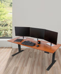 Heavy Duty Electric Standing Desk With Programmable Memory, smooth dual motor lift, 72 inch warm teak surface, in an office setup.