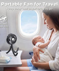 Rechargeable Battery Operated Stroller Fan Clip On for Baby on airplane tray table beside mother holding baby