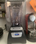 Replacement Parts for Blendtec Jar 90 Oz 3 Quart Premium Pro Grade Blender Jar on kitchen counter with coffee machine