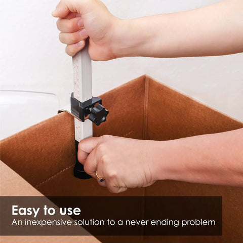Person using Box Resizer Tool With Scoring Wheel For Cardboard Boxes And Shipping Boxes, customizing box size.