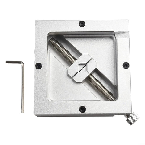 Close-up of 90Mm BGA Reballing Station Metal Table Clamp Soldering Holder with a screwdriver for PCB repair and chip rework.