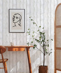 Shiplap Peel And Stick Wallpaper White Wood Plank Vinyl Wrap on wall with desk, chair, and plant decor
