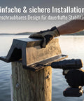 Installation of Beefed-Up Rubber Dock Protector With Arch Bolt-Down Mount using drill on a waterfront dock post.