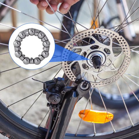 20 Pcs Bike Bearing Set For BMX And Road Rides, showing bearings in fixed cage on bicycle wheel and hub for repair.