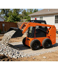 Compact Mini Track Skid Steer Loader Workhorse for construction work with gravel bucket attachment in a residential yard