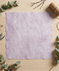 Boss Florist Pop Up Tissue Sheets For Flowers 266 Waterproof Bouquet Paper Easy Peel Dispensing on table with twine and plants